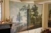 E�n van de beschilderde behangsels van W. Uppink met landschappen in de tuinkamer. (&copy; Walther Schoonenberg)