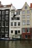 Achtergevel van Warmoesstraat 18 aan het natte Damrak (&copy; Walther Schoonenberg)