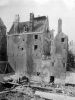 Na de sloop van de Bruinistengang in 1915 kwam de zijgevel en het achterhuis van Barndesteeg 15 in het zicht.