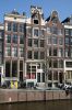 Herengracht 249 tijdens restauratie: 'Stadsherstel herstelt ook hier de stad' (&copy; Walther Schoonenberg)