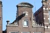 Fraaie laat-17de-eeuwse halsgeveltop. (&copy; Walther Schoonenberg)