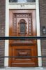Fraaie 19de-eeuwse deur (ontwerp A.L. van Gendt) (© Walther Schoonenberg)