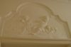 E�n van de reli�fs met putti boven de deur in de gang. (&copy; Walther Schoonenberg)