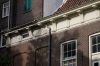 Onderdeel van de Cromhouttuin: de tuingevel van de Huidenstraat (© Walther Schoonenberg)