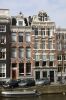 Twee 19de-eeuwse gevels naast elkaar: Keizersgracht 412 en 410. (&copy; Walther Schoonenberg)