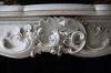 Detail van de witmarmeren schouw Detail van de witmarmeren schouw (© Walther Schoonenberg)