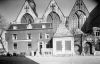 Oudekerksplein 23 met rechts daarvan de Kerkmeesterskamer en het Zuiderportaal van de Oude Kerk Oudekerksplein 23 met rechts daarvan de Kerkmeesterskamer en het Zuiderportaal van de Oude Kerk