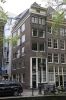 Oudezijds Achterburgwal 187, hoek Spinhuissteeg. (&copy; Walther Schoonenberg)