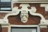 Ontlastingsboog met kopje Ontlastingsboog met kopje (© Walther Schoonenberg)