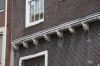 Gebeeldhouwde balkkoppen Gebeeldhouwde balkkoppen (© Walther Schoonenberg)