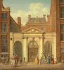 De Schouwburgpoort met daarachter het R.K. Oude Armenkantoor.