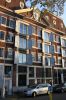 Middenrisaliet gedragen door een groot driehoekig fronton. Middenrisaliet gedragen door een groot driehoekig fronton. (© Walther Schoonenberg)