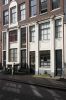 Houten onderpui uit de bouwtijd (&copy; Walther Schoonenberg)