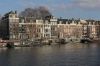 Amstel 55, 57, 59, 61, 63, 65, 67, 69, 71, 73, 75. Een ensemble van huizen van doorlopend dwarsdak (&copy; Walther Schoonenberg)