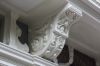 Detail van de gevel met een console met een kop (&copy; Walther Schoonenberg)