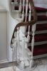 Detail van de trap in Rococo-stijl: flesbalusters (© Walther Schoonenberg)
