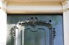 Ornament op de deur in Rococo-stijl (&copy; Walther Schoonenberg)