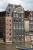Achterhuis van Warmoesstraat 34 aan het Damrak (zonder de leeuwenkoppen) Achterhuis van Warmoesstraat 34 aan het Damrak (zonder de leeuwenkoppen) (© Walther Schoonenberg)