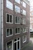 Zijgevel in de Spinhuissteeg (&copy; Walther Schoonenberg)