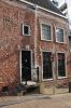 Haarlemmerdijk 61. Zijgevel blootgelegd Haarlemmerdijk 61. Zijgevel blootgelegd (© Walther Schoonenberg)