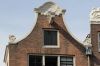 Herplaatste geveltop Herplaatste geveltop (© Walther Schoonenberg)