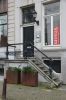Stoep met stoephek en balusters (&copy; Walther Schoonenberg)