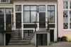 Houten onderpui en stoepen Houten onderpui en stoepen (© Walther Schoonenberg)
