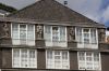 Beeldhouwwerk in de top van de gevel (&copy; Walther Schoonenberg)
