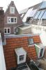 Achterhuis, op de achtergrond het voorhuis (&copy; Walther Schoonenberg)