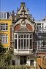 Rijke achtergevel met erker vormt aanzien vanuit grachtenhuis Singel 28 Rijke achtergevel met erker vormt aanzien vanuit grachtenhuis Singel 28