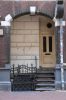 Portiek in de Nieuwe Doelenstraat (&copy; Walther Schoonenberg)