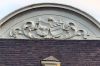 Alliantiewapen in het fronton